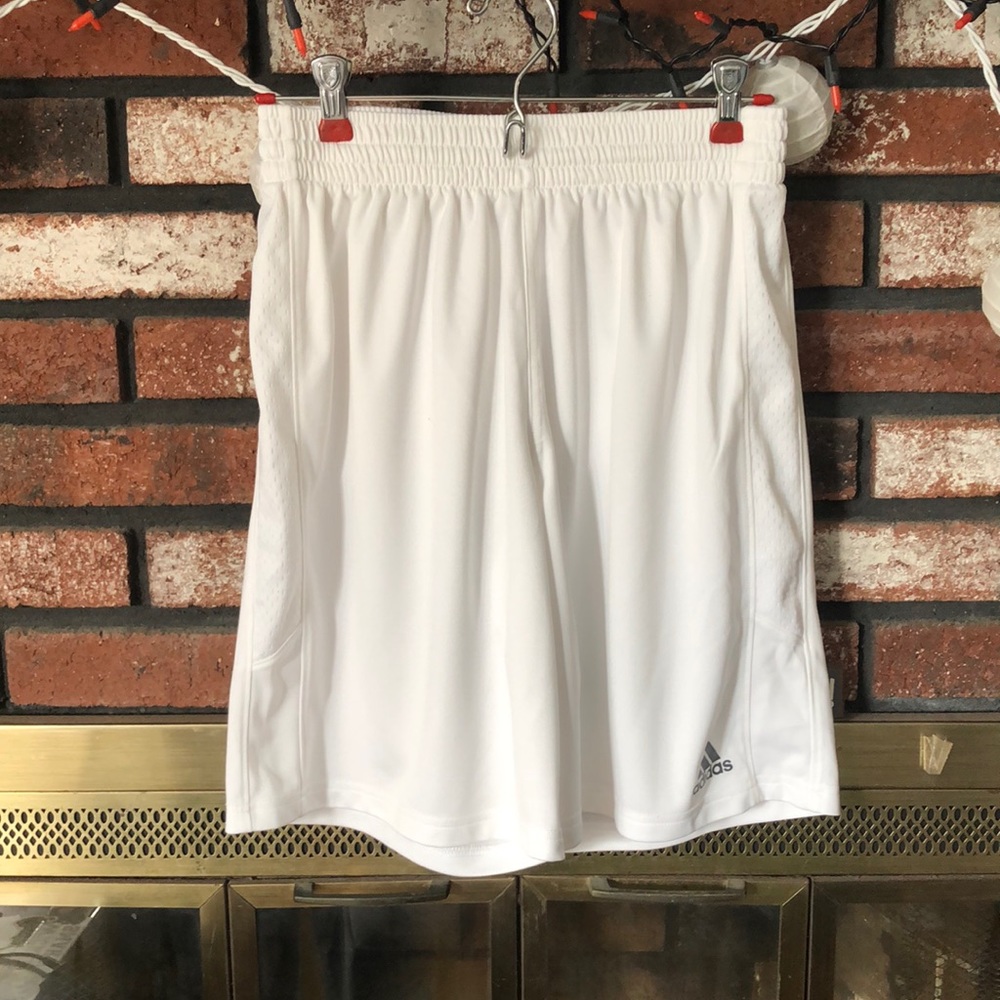 Boys white Adidas performance shorts size small.